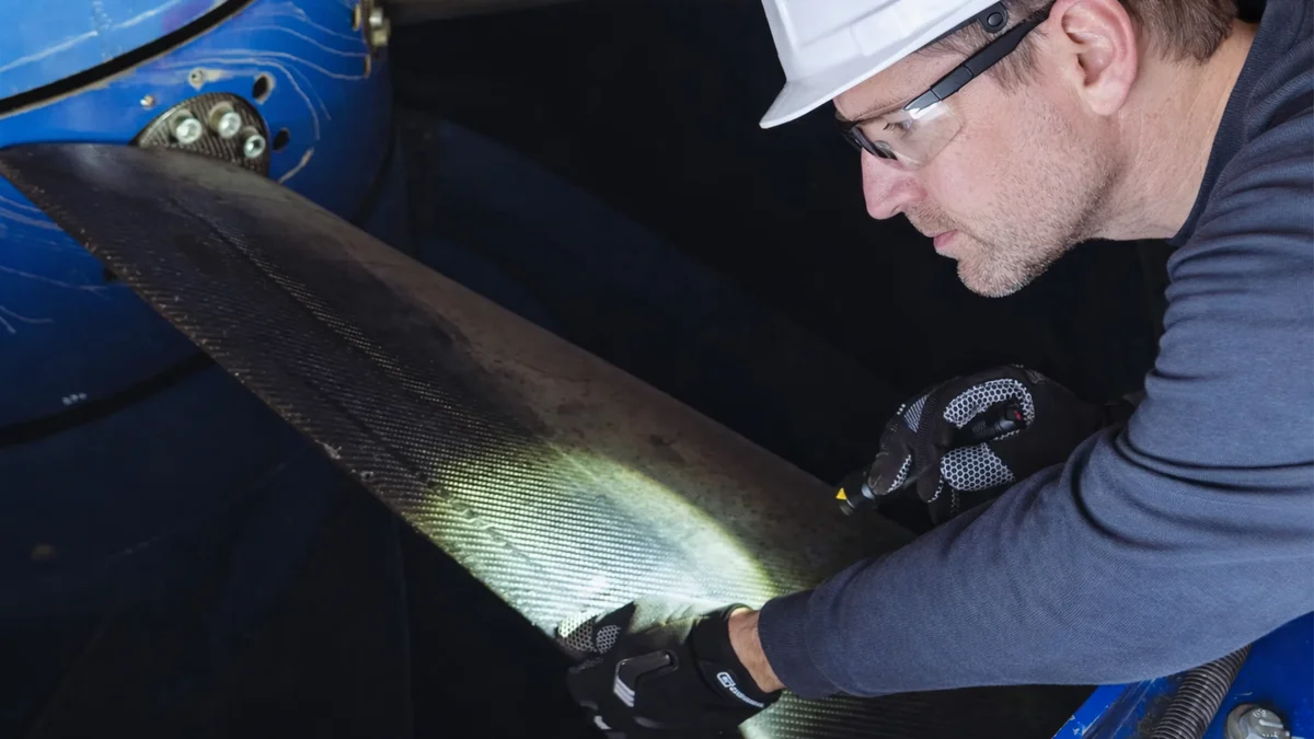 Wind tunnel fan blade inspection